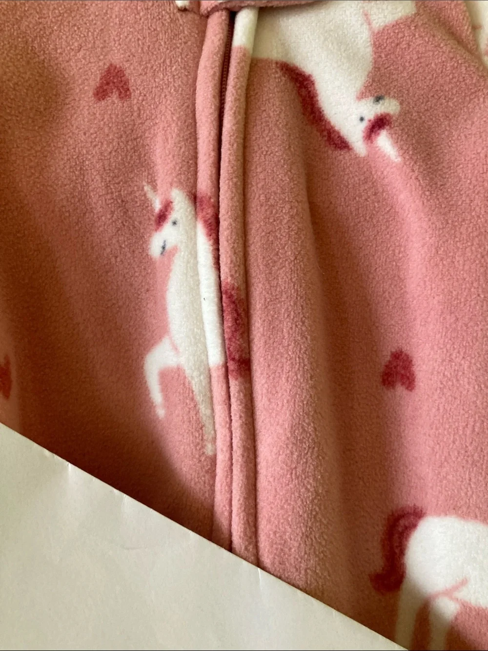 Girls Carter’s pink unicorn footed pajamas size newborn